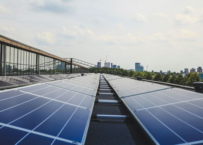 Rooftop solar array being serviced